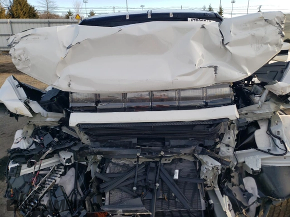 2025 GMC Hummer EV 2X with VIN 1GKB0NDE5SU102096, listed as a Copart auction lot 47083615 with 8,713 mi miles and Salvage Title. Bid and sale history available at carsss.com. Image 12.