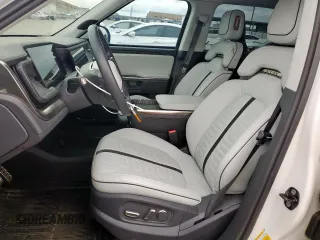2022 Rivian R1T Adventure z VIN 7FCTGAAA8NN013508, wystawiony jako Copart lot #50834485 z przebiegiem Nie podano mil oraz Szkody całkowita. Historia ofert i sprzedaży dostępna na DreamBid. Obrazek 7.