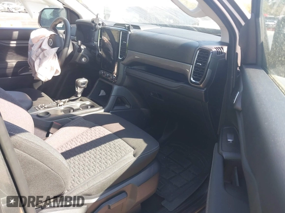 2024 Ford Ranger XLT with VIN 1FTER4GHXRLE46487, listed as a IAAI auction lot 41899384 with 5,570 mi miles. Bid and sale history available at carsss.com. Image 5.
