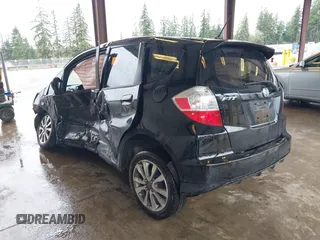 2013 Honda Fit Sport with VIN JHMGE8H57DC033384, listed as a IAAI auction lot 41871356 with 150,777 mi miles. Bid and sale history available at carsss.com. Image 3.