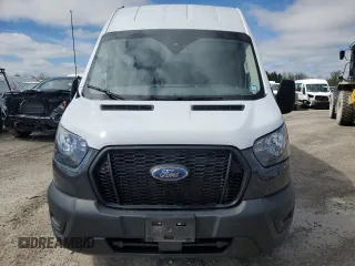 2023 Ford Transit Cargo с VIN 1FTBR2X88PKA66512, выставлен на аукционе Copart как лот 58451445 с пробегом 74 819 миль миль и Списание • Salvage title. История ставок и продаж доступна на DreamBid. Изображение 5.