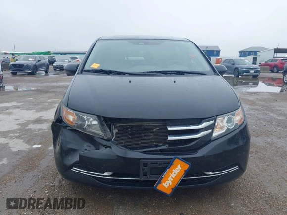 2014 Honda Odyssey EX-L with VIN 5FNRL5H64EB114709, listed as a IAAI auction lot 42131146 with 145,616 mi miles and . Bid and sale history available at DreamBid. Image 12.