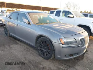 2014 Chrysler 300 with VIN 2C3CCABG9EH160082, listed as a IAAI auction lot 41705556 with 194,551 mi miles. Bid and sale history available at carsss.com. Image 1.