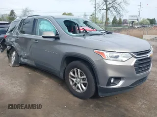 2018 Chevrolet Traverse LT Cloth z VIN 1GNERGKW4JJ135006, wystawiony jako IAAI lot #42147302 z przebiegiem 66 267 mil mil oraz . Historia ofert i sprzedaży dostępna na DreamBid. Obrazek 1.