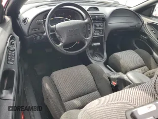 1994 Ford Mustang z VIN 1FALP45T9RF162535, wystawiony jako Copart lot #53549795 z przebiegiem 86 430 mil mil oraz Szkoda całkowita • Salvage title. Historia ofert i sprzedaży dostępna na DreamBid. Obrazek 8.