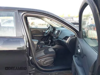 2016 Jeep Cherokee Sport with VIN 1C4PJLAB2GW136778, listed as a IAAI auction lot 42188091 with 120,866 mi miles and . Bid and sale history available at DreamBid. Image 5.