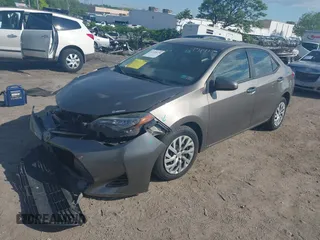 2018 Toyota Corolla L z VIN 2T1BURHE9JC971913, wystawiony jako IAAI lot #42220378 z przebiegiem 113 437 mil mil oraz . Historia ofert i sprzedaży dostępna na DreamBid. Obrazek 17.