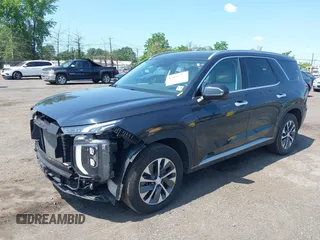 2022 Hyundai Palisade SEL with VIN KM8R24HE8NU439161, listed as a IAAI auction lot 42401797 with 86,436 mi miles and . Bid and sale history available at DreamBid. Image 2.