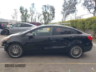 2013 Kia Rio LX with VIN KNADM4A34D6299708, listed as a IAAI auction lot 41926111 with 60,568 mi miles. Bid and sale history available at carsss.com. Image 15.