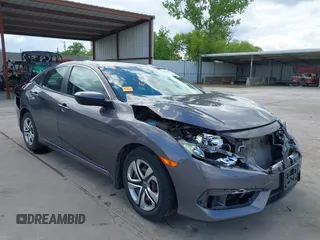2017 Honda Civic LX z VIN 19XFC2F52HE021192, wystawiony jako IAAI lot #42238963 z przebiegiem 70 501 mil mil oraz . Historia ofert i sprzedaży dostępna na DreamBid. Obrazek 1.