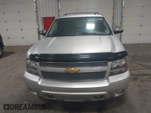 2012 Chevrolet Tahoe LT z VIN 1GNSCBE01CR326465, wystawiony jako IAAI lot #42183450 z przebiegiem 220 129 mil mil oraz . Historia ofert i sprzedaży dostępna na DreamBid. Obrazek 12.