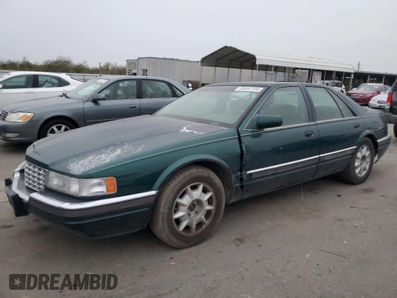 1997 Cadillac Seville Luxury SLS with VIN 1G6KS52YXVU816137, listed as a Copart auction lot 85664104 with 161,553 mi miles and Salvage Title. Bid and sale history available at carsss.com. Image 1.