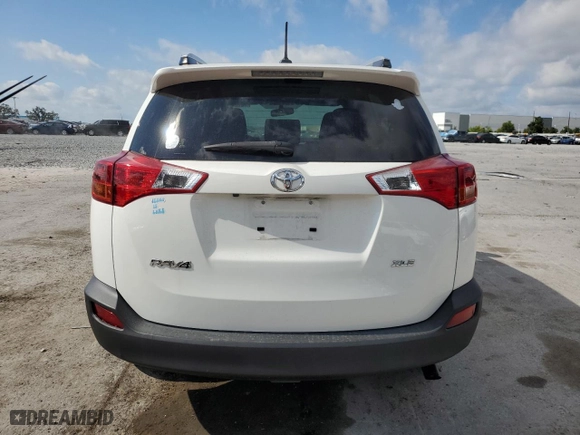2015 Toyota RAV4 XLE with VIN JTMWFREV9FJ053896, listed as a Copart auction lot 52779985 with 115,190 mi miles and Salvage Title. Bid and sale history available at carsss.com. Image 6.