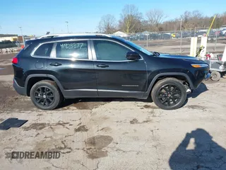 2016 Jeep Cherokee 75th Anniversary with VIN 1C4PJLCB5GW107918, listed as a IAAI auction lot 41923377 with 165,619 mi miles and . Bid and sale history available at DreamBid. Image 13.