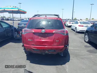 2018 Toyota RAV4 XLE with VIN 2T3WFREV4JW505053, listed as a IAAI auction lot 42552459 with 94,552 mi miles and . Bid and sale history available at DreamBid. Image 17.