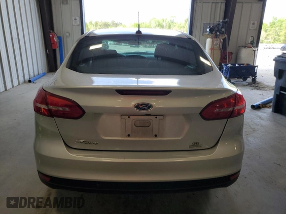 2018 Ford Focus SE z VIN 1FADP3FE9JL234158, wystawiony jako Copart lot #51788755 z przebiegiem 99 877 mil mil oraz Szkoda całkowita • Salvage title. Historia ofert i sprzedaży dostępna na DreamBid. Obrazek 6.