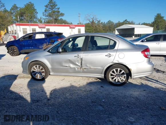 2010 Suzuki SX4 with VIN JS2YC5A46A6310134, listed as a IAAI auction lot 41696108 with 147,059 mi miles and . Bid and sale history available at DreamBid. Image 14.