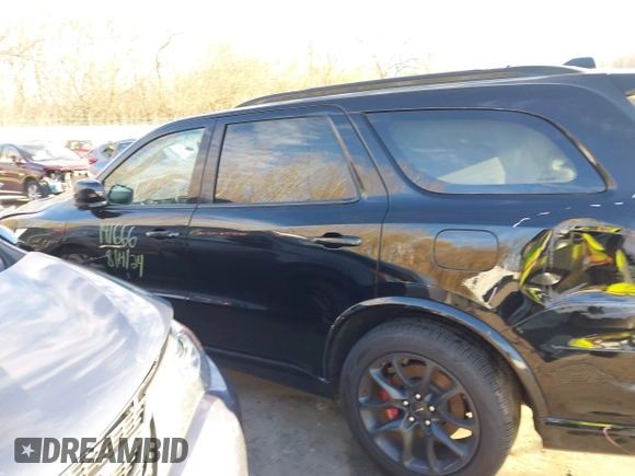 2023 Dodge Durango SRT 392 Premium with VIN 1C4SDJGJ9PC693449, listed as a IAAI auction lot 40796697 with 4,633 mi miles and . Bid and sale history available at DreamBid. Image 14.