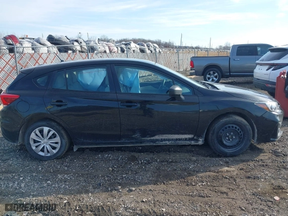 2017 Subaru Impreza with VIN 4S3GTAA60H3746716, listed as a IAAI auction lot 41846153 with 76,704 mi miles. Bid and sale history available at carsss.com. Image 13.