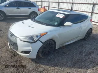 2013 Hyundai Veloster w/Gray Int with VIN KMHTC6AD4DU140121, listed as a IAAI auction lot 41410252 with 202,596 mi miles and . Bid and sale history available at DreamBid. Image 2.