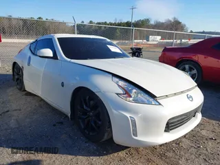 2015 Nissan 370Z Sport with VIN JN1AZ4EH0FM440627, listed as a IAAI auction lot 41410844 with 99,420 mi miles. Bid and sale history available at carsss.com. Image 1.