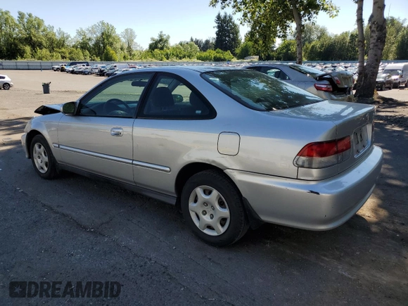 1999 Honda Civic EX with VIN 1HGEJ8144XL002704, listed as a Copart auction lot 58281674 with 155,981 mi miles and Salvage Title. Bid and sale history available at carsss.com. Image 2.