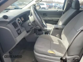 2006 Dodge Durango SXT with VIN 1D4HB38NX6F107225, listed as a Copart auction lot 49965475 with 105,577 mi miles and Salvage title. Bid and sale history available at DreamBid. Image 7.