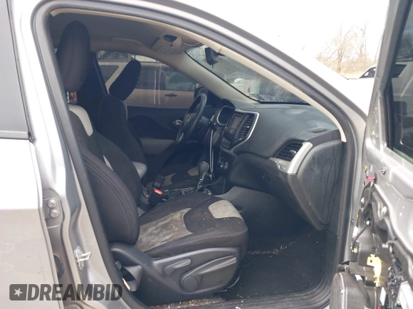 2014 Jeep Cherokee Sport with VIN 1C4PJLAB5EW268916, listed as a IAAI auction lot 41715729 with 116,544 mi miles and . Bid and sale history available at DreamBid. Image 5.