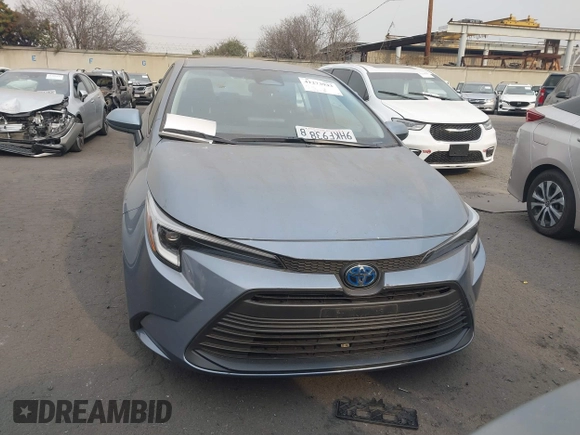 2023 Toyota Corolla Hybrid LE with VIN JTDBCMFE0P3023071, listed as a IAAI auction lot 41273943 with 26,250 mi miles. Bid and sale history available at carsss.com. Image 12.