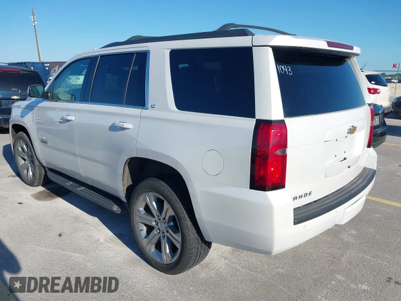 2018 Chevrolet Tahoe LT with VIN 1GNSCBKC7JR101043, listed as a IAAI auction lot 42192481 with 152,831 mi miles and . Bid and sale history available at DreamBid. Image 3.