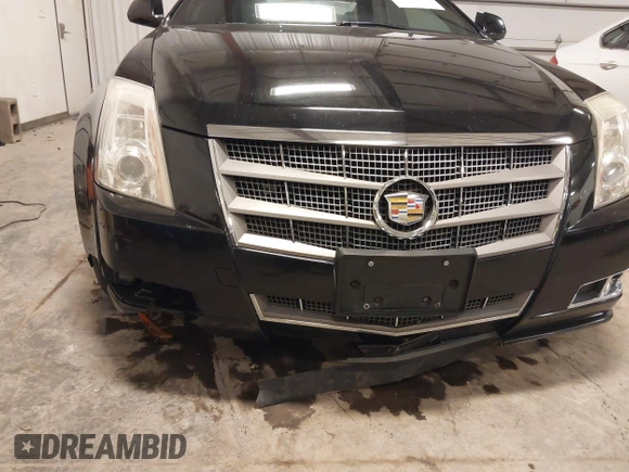 2011 Cadillac CTS Performance z VIN 1G6DL1ED3B0100075, wystawiony jako IAAI lot #41392627 z przebiegiem 124 775 mil mil oraz . Historia ofert i sprzedaży dostępna na DreamBid. Obrazek 6.