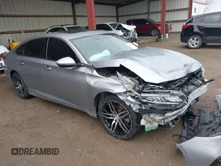 2022 Honda Accord Touring with VIN 1HGCV3F94NA007073, listed as a IAAI auction lot 41946002 with 34,657 mi miles and . Bid and sale history available at DreamBid. Image 1.