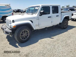 2022 Jeep Gladiator High Altitude с VIN 1C6HJTFGXNL159286, выставлен на аукционе Copart как лот 56071285 с пробегом 30 581 миль миль и Списание • Salvage title. История ставок и продаж доступна на DreamBid. Изображение 1.