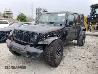 2024 Jeep Wrangler Rubicon X z VIN 1C4RJXFG0RW165235, wystawiony jako Copart lot #57580305 z przebiegiem 16 315 mil mil oraz Szkoda całkowita • Salvage title. Historia ofert i sprzedaży dostępna na DreamBid. Obrazek 1.