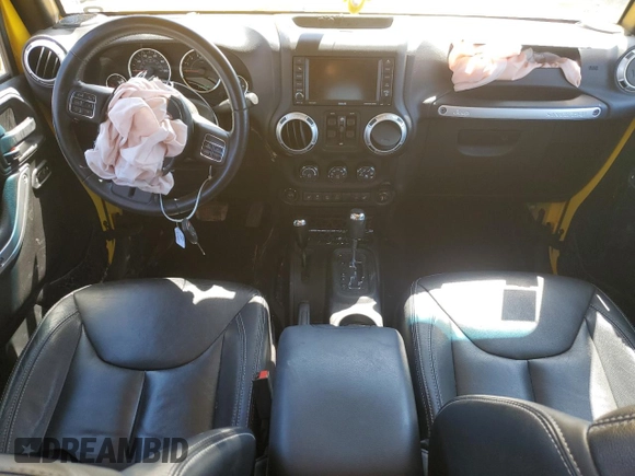 2015 Jeep Wrangler Unlimited Sahara with VIN 1C4HJWEG7FL593355, listed as a Copart auction lot 56784425 with 74,498 mi miles and Salvage title. Bid and sale history available at DreamBid. Image 8.