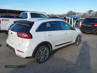 2018 Kia Niro Touring with VIN KNDCE3LC7J5179521, listed as a IAAI auction lot 41310921 with 75,620 mi miles. Bid and sale history available at carsss.com. Image 4.