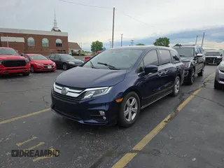 2018 Honda Odyssey EX-L with VIN 5FNRL6H75JB064377, listed as a Copart auction lot 56241905 with 103,651 mi miles and Clean Title. Bid and sale history available at DreamBid. Image 2.