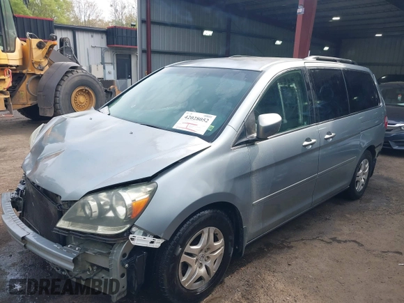 2006 Honda Odyssey EX with VIN 5FNRL38406B066176, listed as a IAAI auction lot 42028052 with 136,305 mi miles and . Bid and sale history available at DreamBid. Image 2.