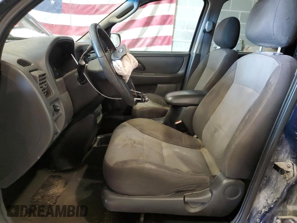 2004 Ford Escape XLS with VIN 1FMYU92154KA14600, listed as a Copart auction lot 83101474 with 305,444 mi miles and Salvage Title. Bid and sale history available at DreamBid. Image 7.