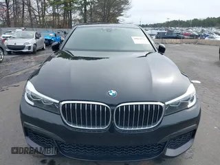 2019 BMW 7 Series 740i with VIN WBA7E2C57KB217973, listed as a IAAI auction lot 39064321 with 54,818 mi miles and . Bid and sale history available at DreamBid. Image 6.