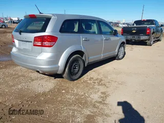 2014 Dodge Journey American Value Pkg with VIN 3C4PDCAB5ET119192, listed as a IAAI auction lot 41344250 with 228,461 mi miles. Bid and sale history available at carsss.com. Image 4.