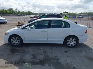 2010 Honda Civic LX with VIN 2HGFA1F54AH533810, listed as a IAAI auction lot 42171253 with 211,551 mi miles and . Bid and sale history available at DreamBid. Image 14.