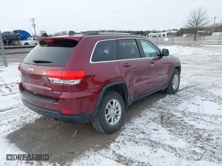 2018 Jeep Grand Cherokee Laredo E with VIN 1C4RJFAG9JC504596, listed as a IAAI auction lot 41595149 with 93,713 mi miles. Bid and sale history available at carsss.com. Image 4.