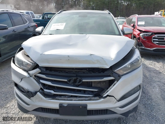 2018 Hyundai Tucson Value with VIN KM8J3CA21JU816783, listed as a IAAI auction lot 41716795 with 84,580 mi miles. Bid and sale history available at carsss.com. Image 12.