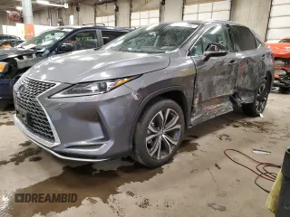 2022 Lexus RX with VIN 2T2HZMDA2NC323851, listed as a Copart auction lot 70025382 with 26,613 mi miles. Bid and sale history available at carsss.com. Image 1.