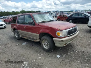 2000 Mercury Mountaineer with VIN 4M2ZU86P2YUJ30049, listed as a Copart auction lot 58619545 with 149,673 mi miles and Salvage title. Bid and sale history available at DreamBid. Image 4.