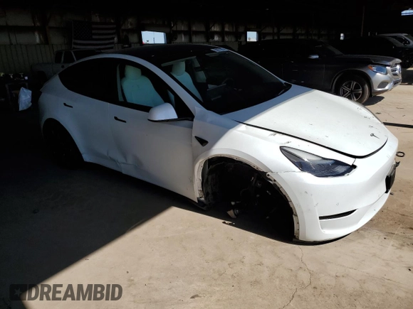 2022 Tesla Model Y Performance z VIN 7SAYGDEF0NF337959, wystawiony jako Copart lot #56871985 z przebiegiem 54 527 mil mil oraz Szkoda całkowita • Salvage title. Historia ofert i sprzedaży dostępna na DreamBid. Obrazek 4.