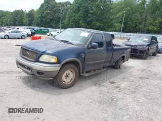 2003 Ford F-150 XL with VIN 1FTRX18W63NA57957, listed as a IAAI auction lot 42514779 with 406,771 mi miles and . Bid and sale history available at DreamBid. Image 2.