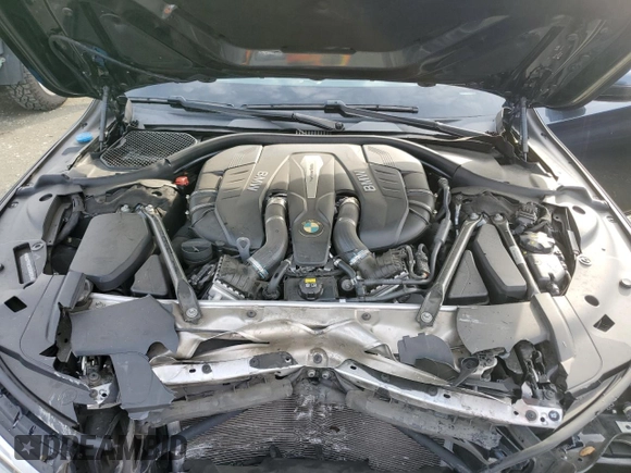 2016 BMW 7 Series 750i with VIN WBA7F0C5XGGM20402, listed as a Copart auction lot 86011914 with 90,123 mi miles and Salvage Title. Bid and sale history available at carsss.com. Image 11.