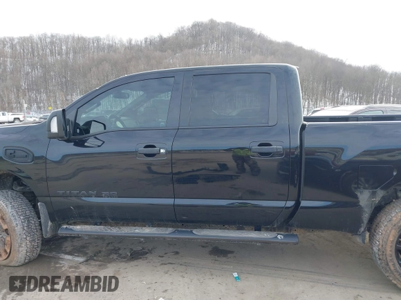 2018 Nissan Titan XD SV with VIN 1N6BA1F49JN521838, listed as a IAAI auction lot 41606878 with 143,742 mi miles. Bid and sale history available at carsss.com. Image 15.